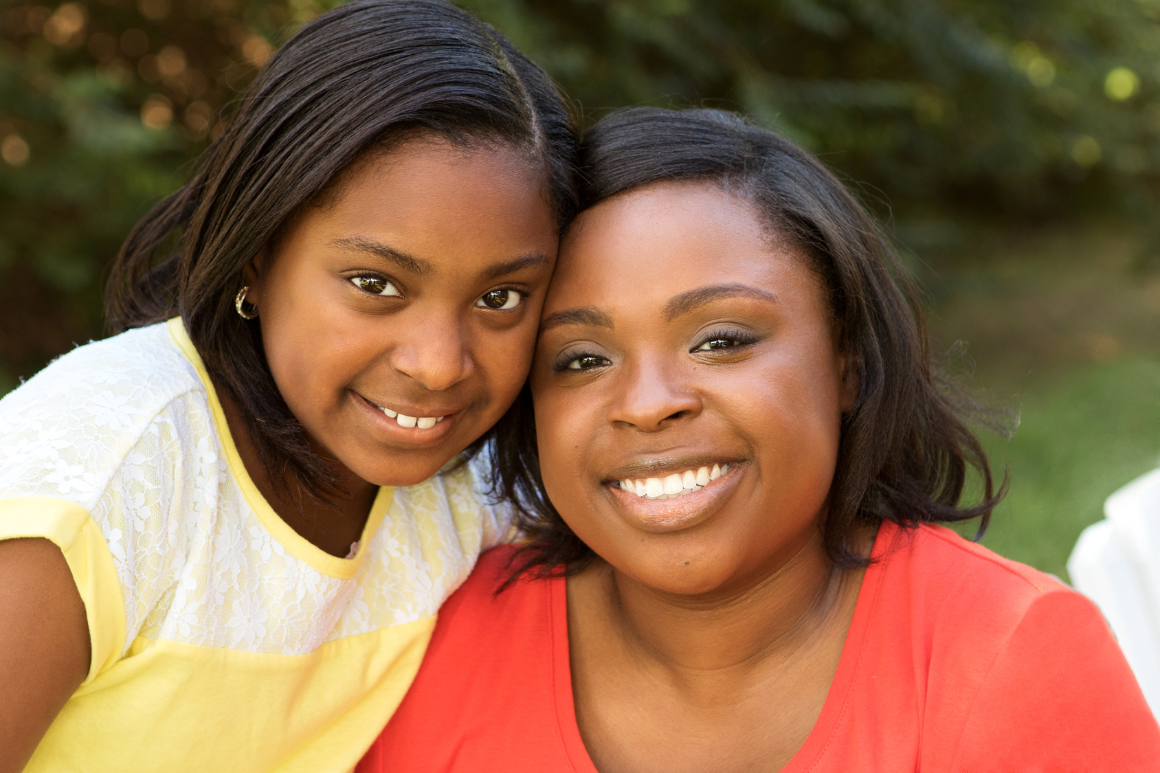Portrait of an African American mother and her daughter.
