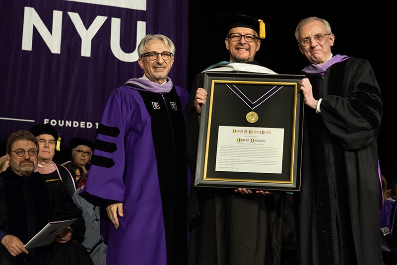 Presenting Marco Damiani, CEO of AHRC New York City, with the David B. Kriser Medal, are, Dr. Stuart Hirsch, left, Vice Dean for International Initiatives, and Dr. Charles N. Bertolami, right, Her-man Robert Fox Dean, NYU College of Dentistry