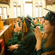 Soon to be Threshold graduates listening to graduation speakers (Photo courtesy of Lesley University)