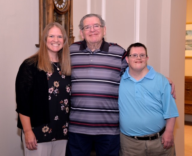 Suzanne with her father and brother John