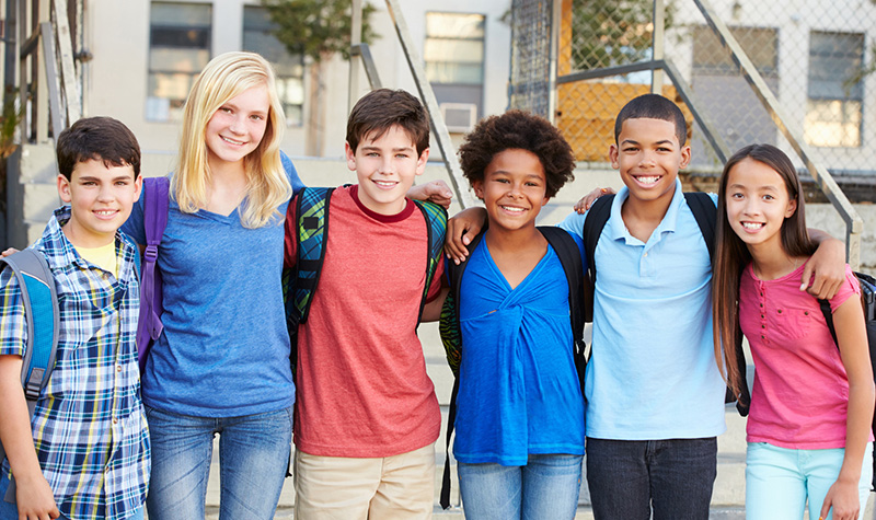 Group of elementary students outside classroom