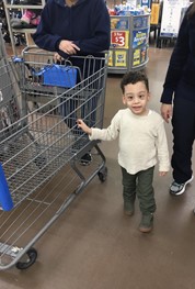 Holding onto the shopping cart