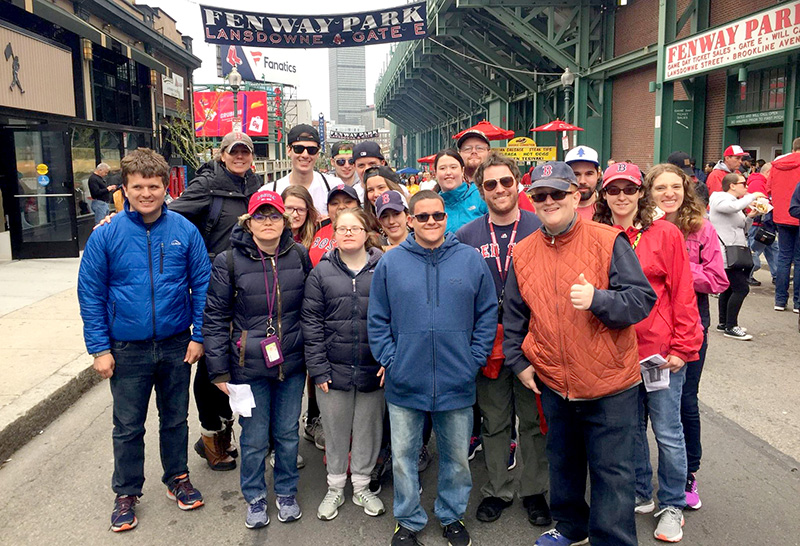 Threshold students, staff and alumni enjoying a Red Sox game at Fenway Park. They are able to choose among several special events offered at Threshold each week.