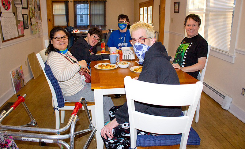 Patrick and his housemates about to share “family dinner” together at their home