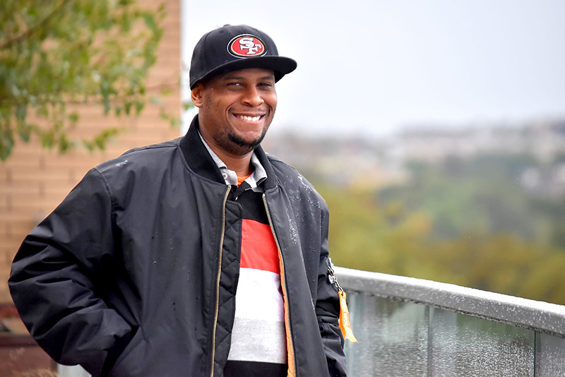 Walter Glasco enjoys the view from the communal outdoor space from Parkside Terrace in the Bronx