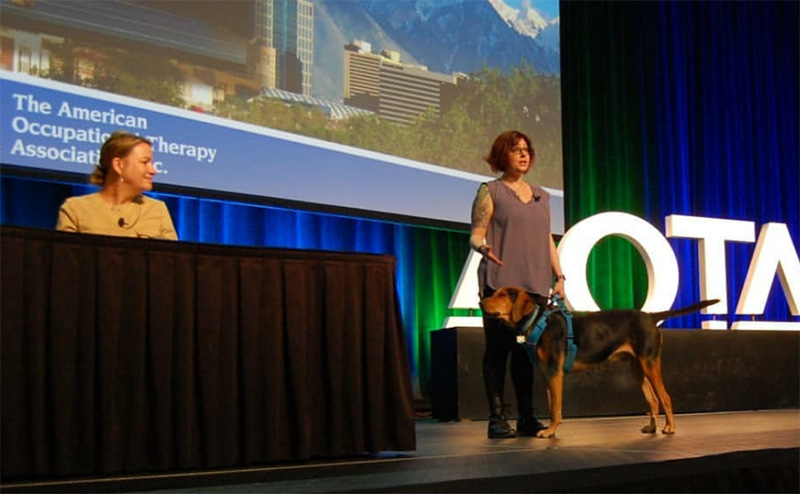 Becca presents on adult autism supports with her Emotional Support Animal, Walter, at the Association of Occupational Therapy’s National Conference.