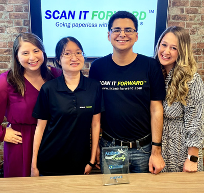 UM-NSU CARD Staff awards one of their newest Autism Friendly Partners, Scan It Forward. Jose Roman and Alison Kong are Job SEEKer graduates and the newest hire for their company.