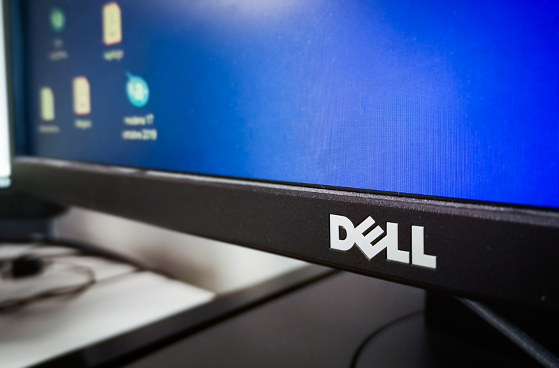 Closeup of a Dell monitor on a desk in an office